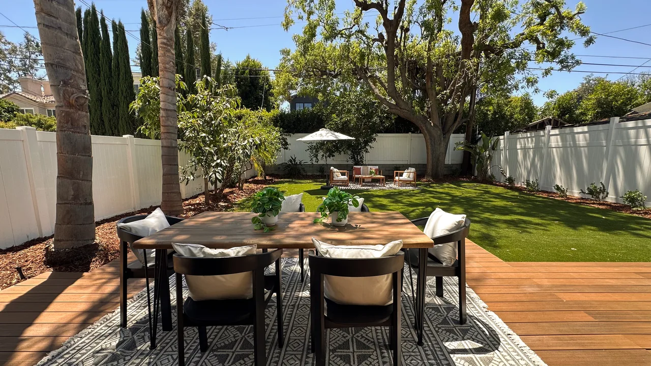 The deck and outdoor dining area looking toward the garden.
